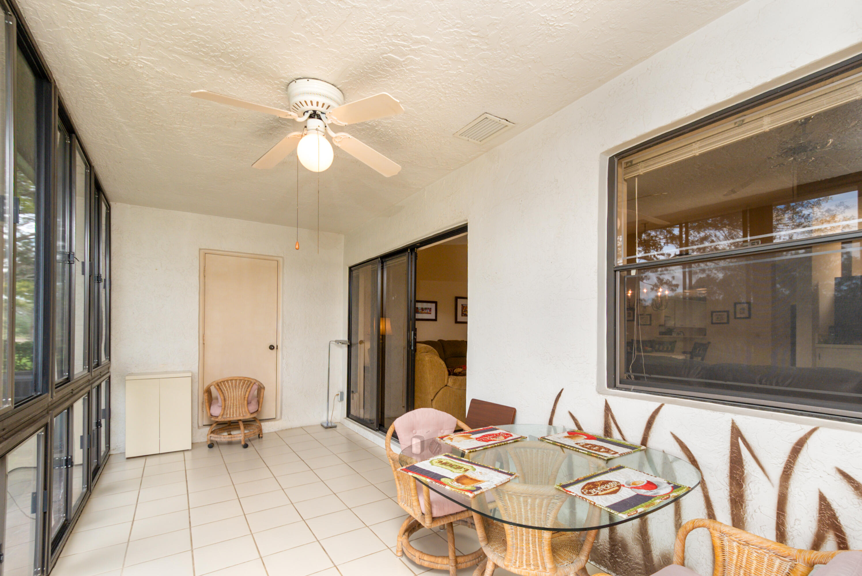 10867 Waterberry Court Boca Raton, FL 33498 - Photo 9 of 30 a dining room with furniture and window