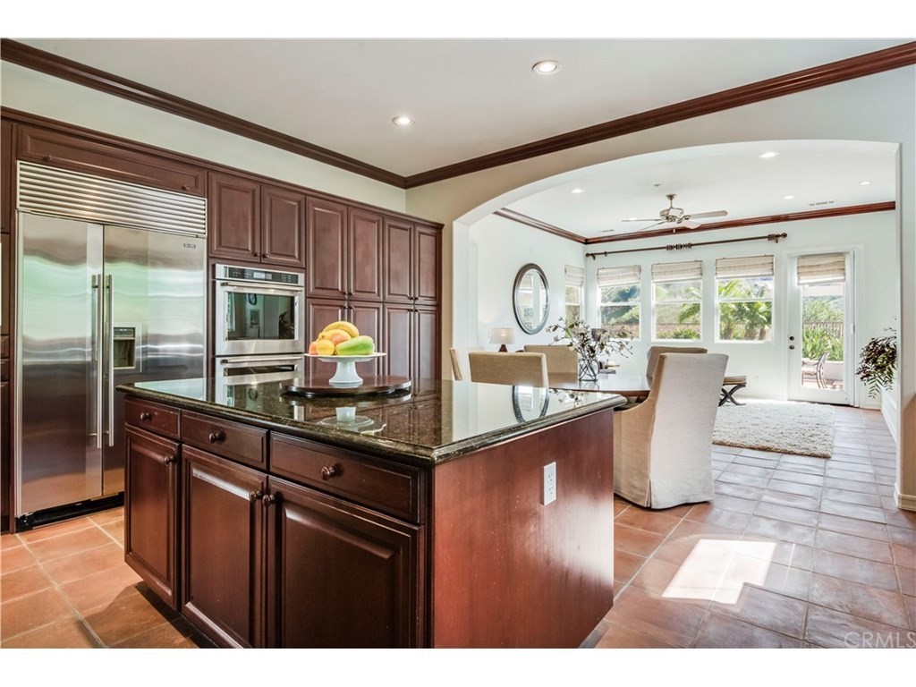 440 Tangerine Place Brea, CA 92823 - Photo 13 of 24 a kitchen with a large counter top appliances and cabinets