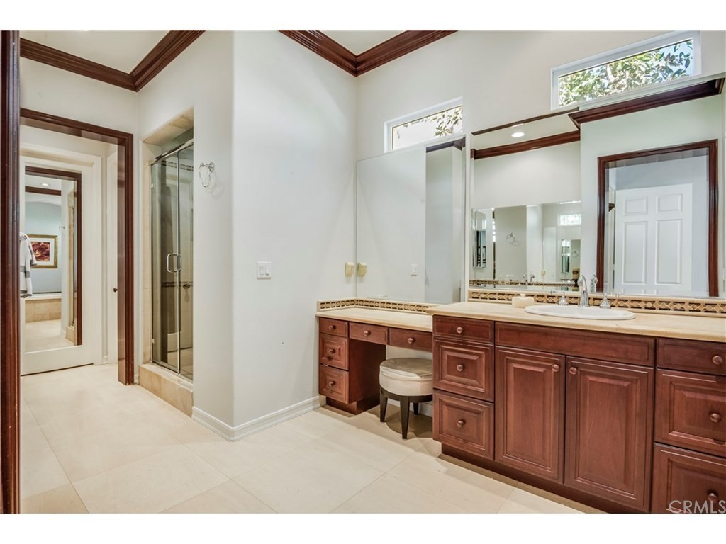 440 Tangerine Place Brea, CA 92823 - Photo 17 of 24 a bathroom with a sink and a mirror