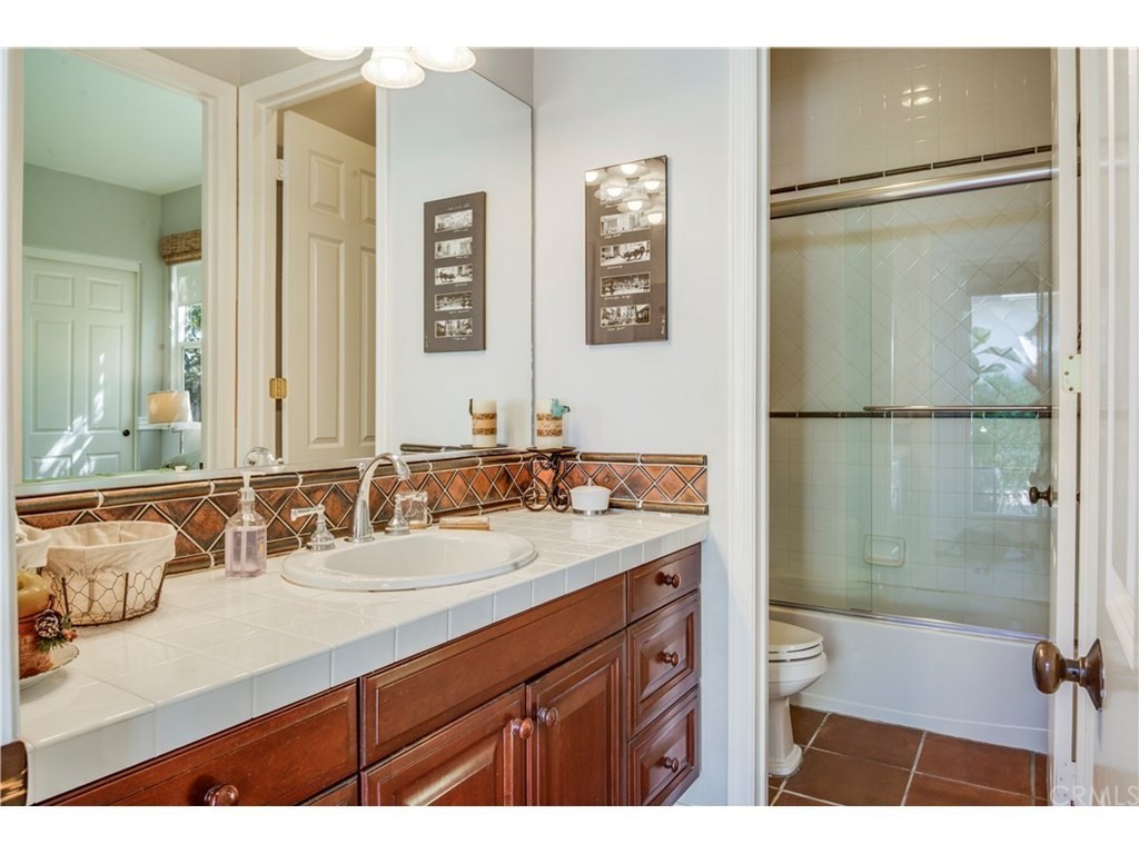 440 Tangerine Place Brea, CA 92823 - Photo 19 of 23 a bathroom with a sink and a mirror