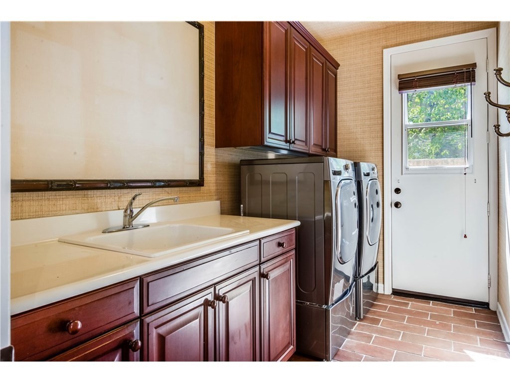 440 Tangerine Place Brea, CA 92823 - Photo 20 of 23 a kitchen with a refrigerator and a sink