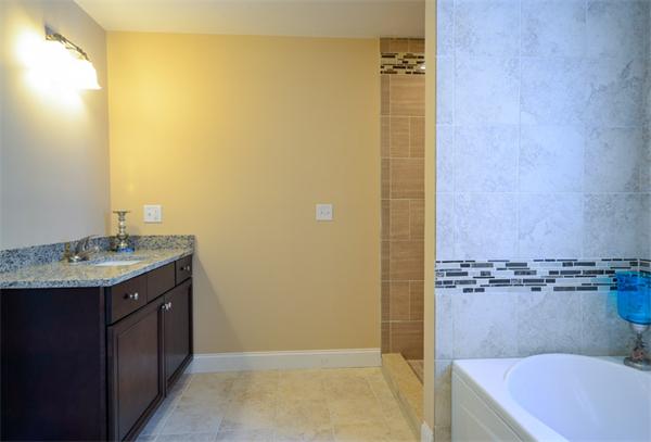 53 Great Road Stow, MA 01775 - Photo 16 of 23 a bathroom with a granite countertop sink and a mirror