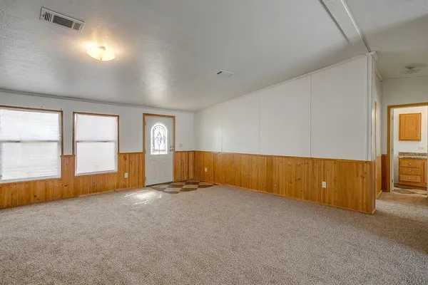 an empty room with windows