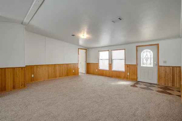 an empty room with windows