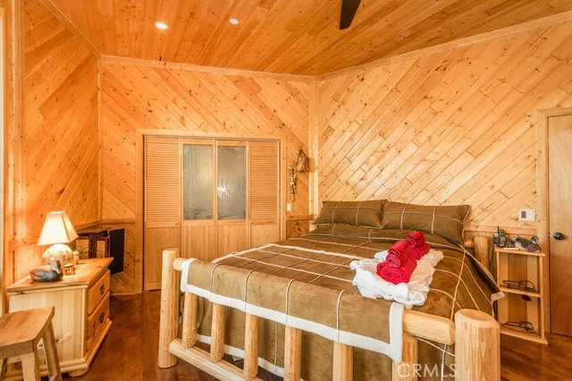 a bedroom with furniture and windows