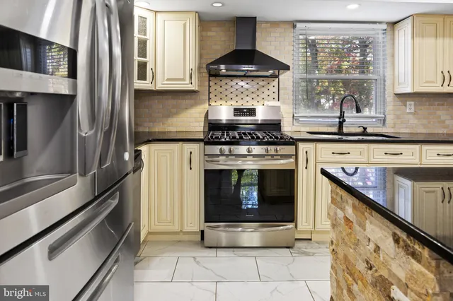 a view of a livingroom with furniture wooden floor and window