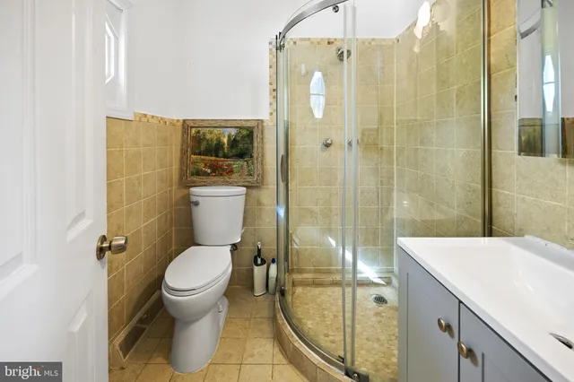 a bathroom with a bathtub and shower