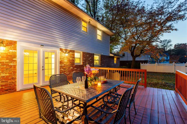 a view of a brick house with a large window
