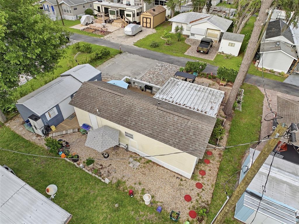 2092 Culbreath Road, Unit A42 Brooksville, FL 34602 - Photo 56 of 70 an aerial view of a house with a garden