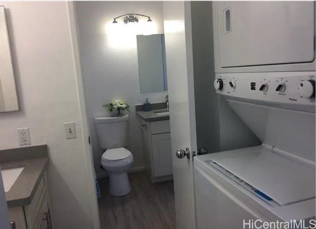 a bathroom with a sink and toilet