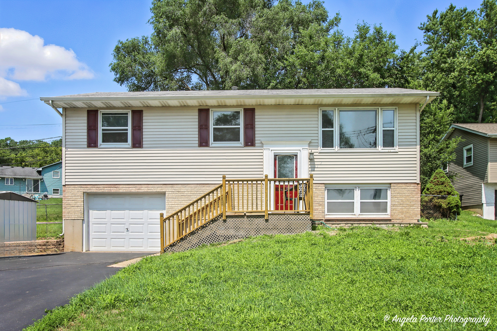 front view of a house with a yard
