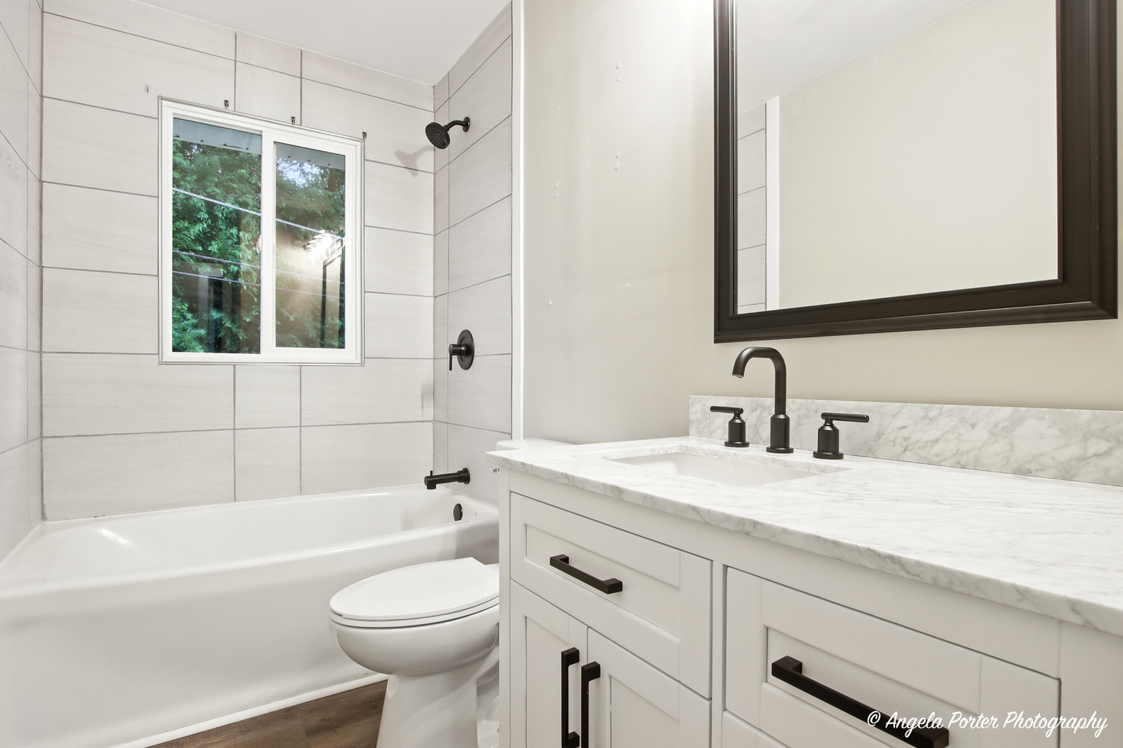 4117 North Johnsburg Road Johnsburg, IL 60051 - Photo 18 of 25 a bathroom with a sink a toilet and shower