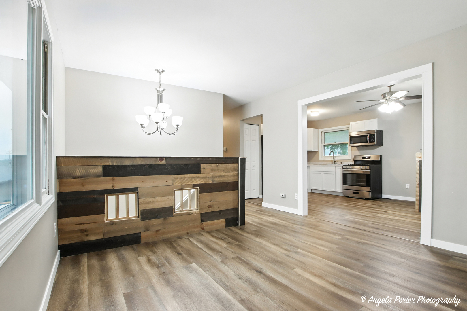 4117 North Johnsburg Road Johnsburg, IL 60051 - Photo 5 of 25 a view of a kitchen with a sink and a refrigerator