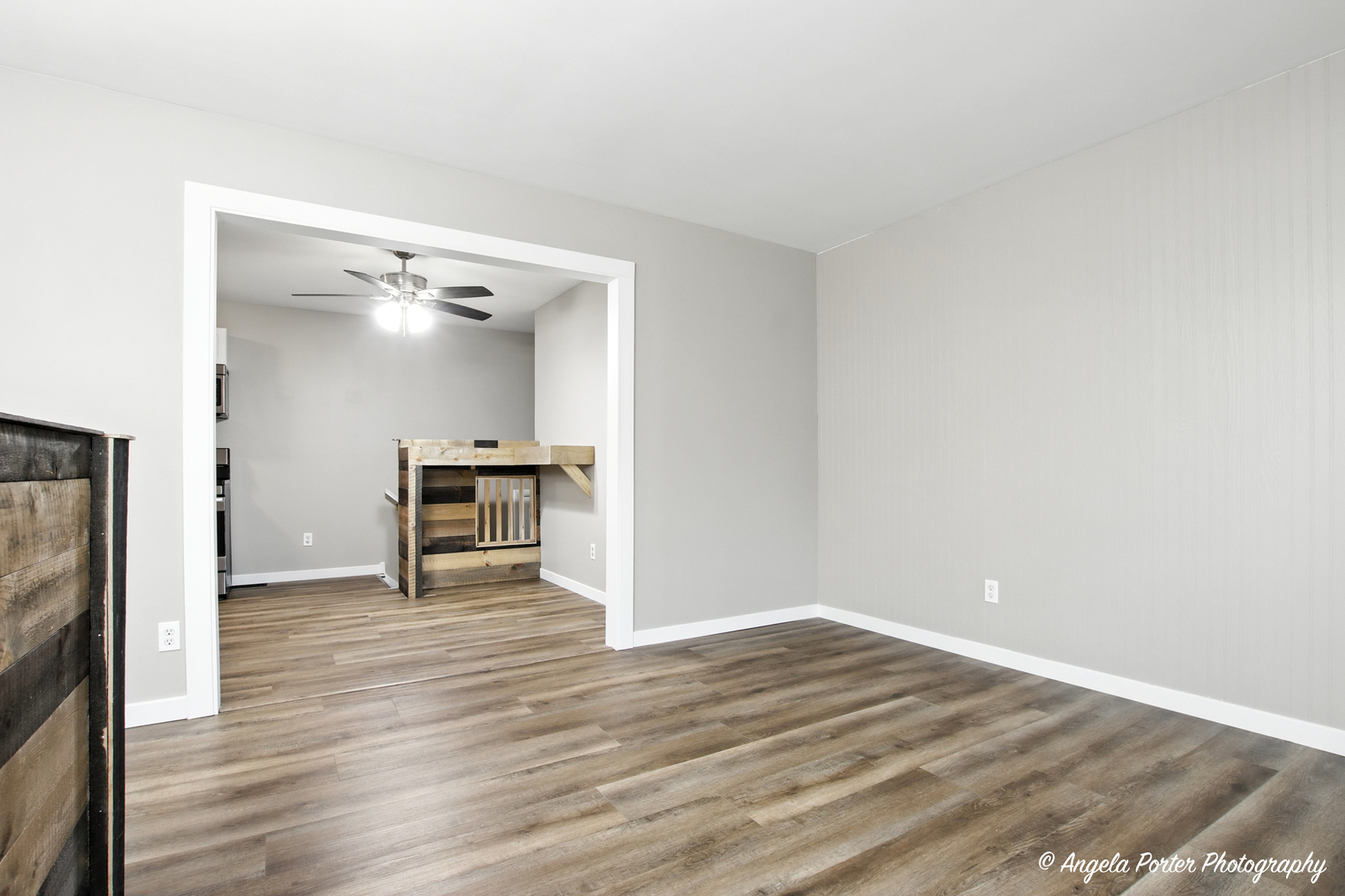 4117 North Johnsburg Road Johnsburg, IL 60051 - Photo 6 of 25 a view of an empty room with wooden floor
