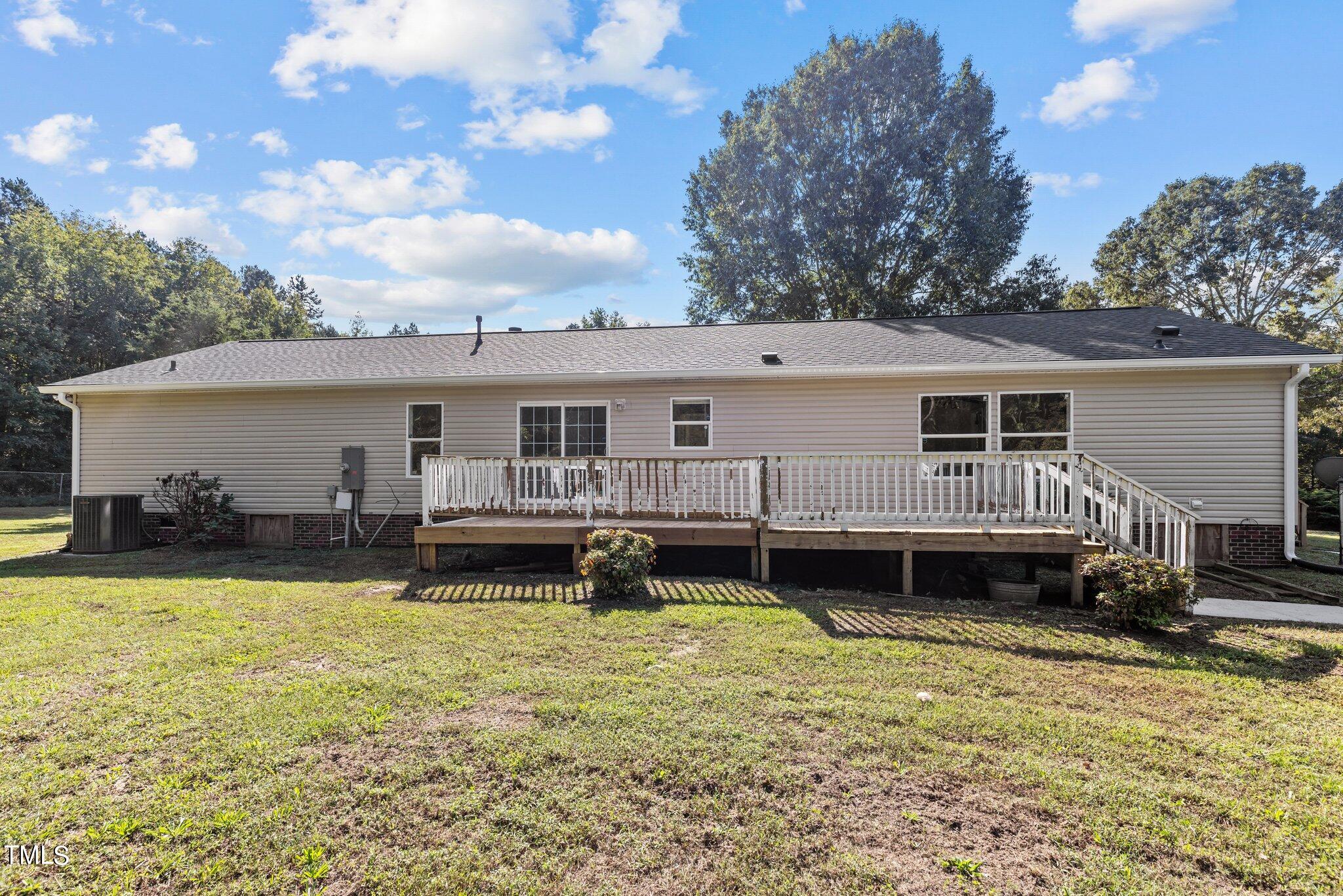 89 Munday Road Roxboro, NC 27574 - Photo 25 of 46 a view of a house with swimming pool and sitting area