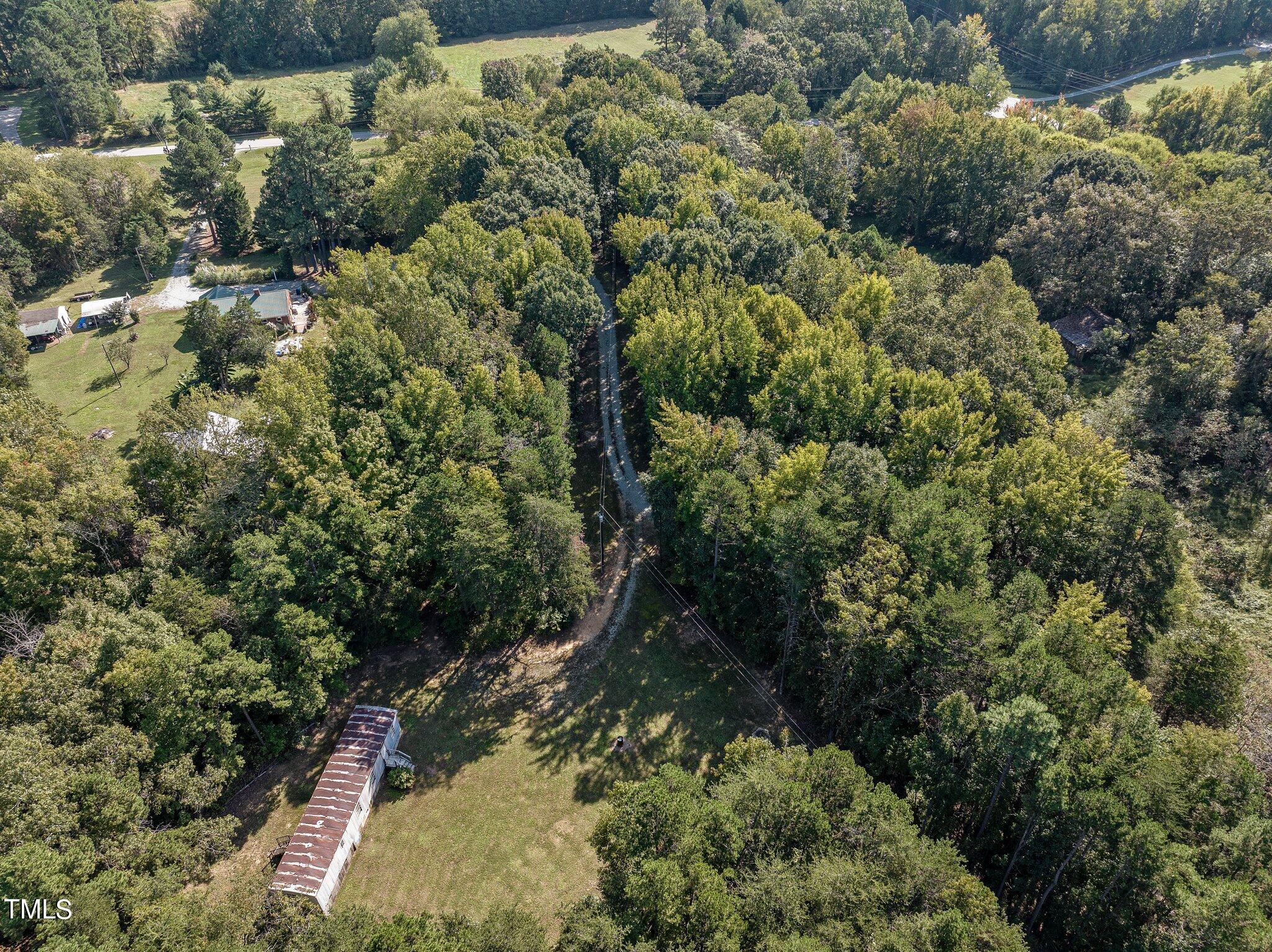 89 Munday Road Roxboro, NC 27574 - Photo 35 of 46 an aerial view of residential house with outdoor space