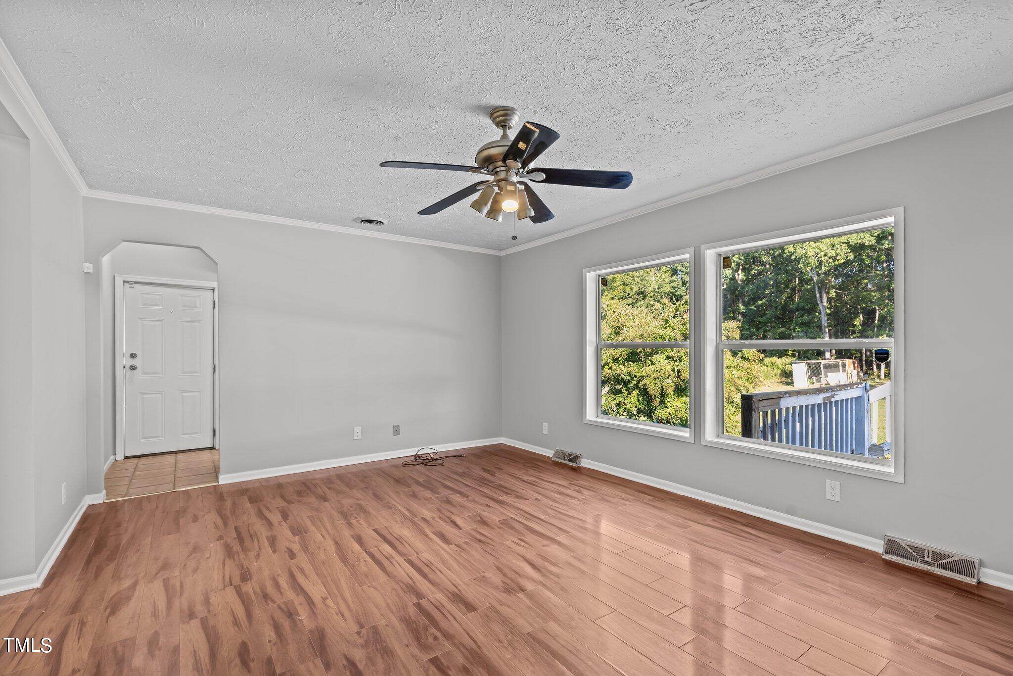 89 Munday Road Roxboro, NC 27574 - Photo 5 of 46 a view of an empty room with a window