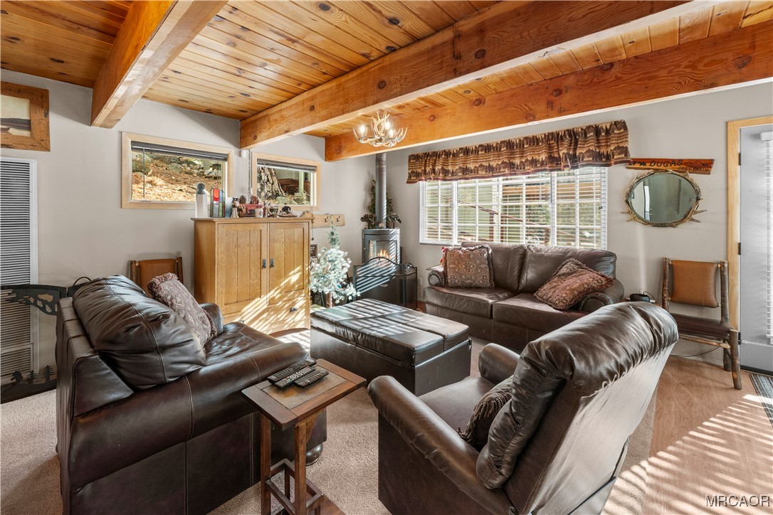 1289 Canyon Road Fawnskin, CA 92333 - Photo 4 of 23 a living room with furniture and a window