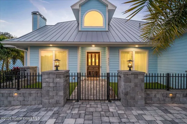 a bathroom with a double vanity sink mirror and shower