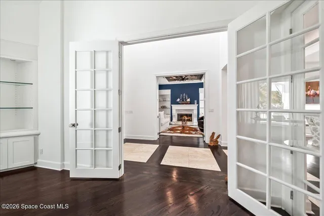 a view of a swimming pool with a yard