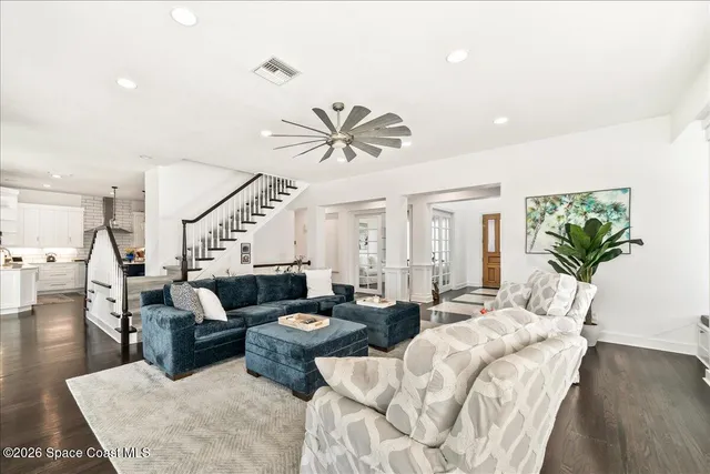 an aerial view of a residential houses with outdoor space