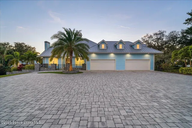 a kitchen with granite countertop a stove sink and cabinets