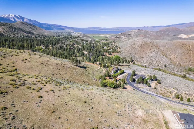 a view of a backyard of a house