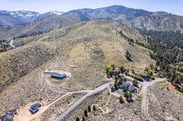 a view of a backyard with wooden floor