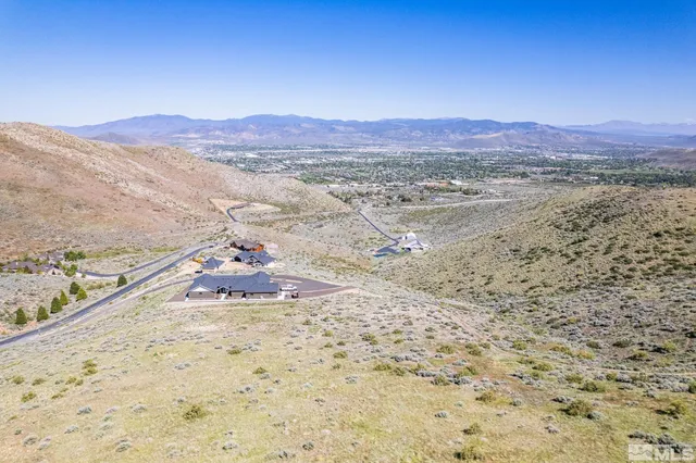 a view of a mountain with a mountain