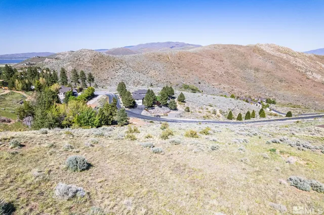 a view of a backyard of a house