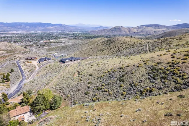 a view of a mountain with a lake