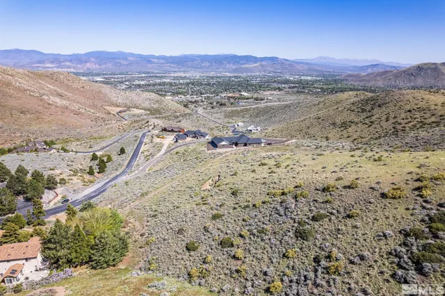 a view of a mountain with a mountain