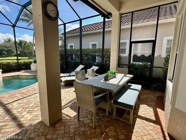 a outdoor dining space with furniture