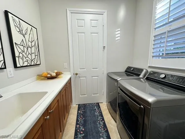 a kitchen with a stove and a sink