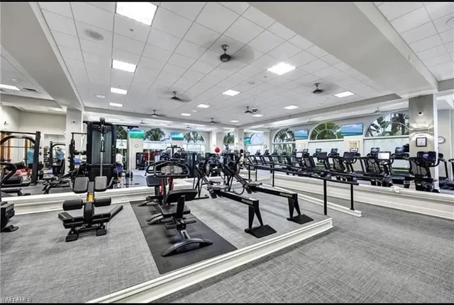 a view of a room with lots of furniture