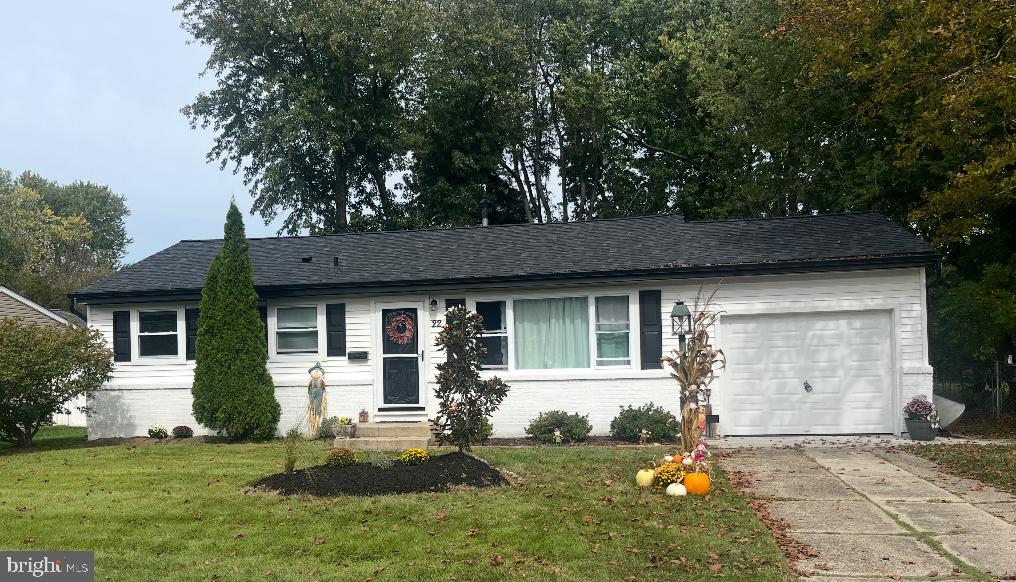 22 Bettlewood Road Marlton, NJ 08053 - Photo 1 of 15 a front view of a house with a yard