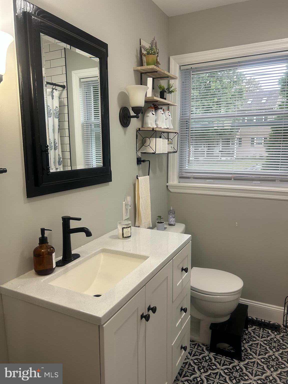 22 Bettlewood Road Marlton, NJ 08053 - Photo 10 of 15 a bathroom with a toilet sink and mirror