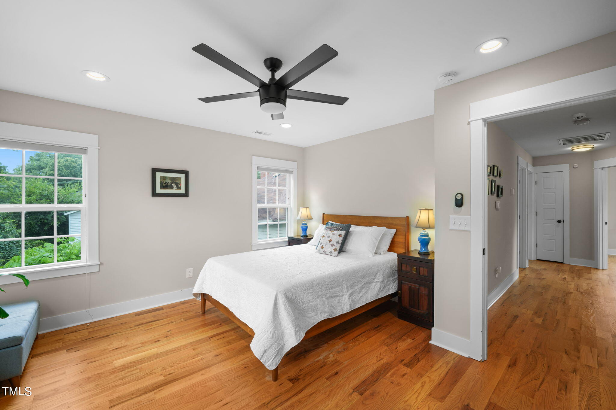 610 Gray Avenue Durham, NC 27701 - Photo 22 of 42 a bedroom with a bed and a window