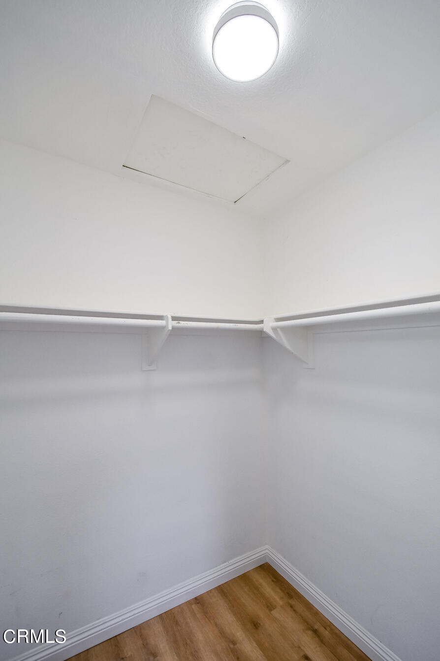 249 Alpine Street, Unit 53 Pasadena, CA 91106 - Photo 21 of 33 a view of a room with shelf on the wall