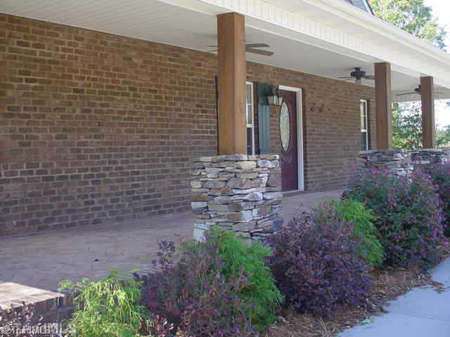 350 Rockcrusher Road Lexington, NC 27292 - Photo 2 of 12 Exterior Front. Side view of porch