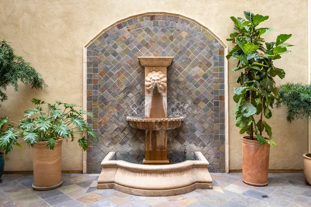 a view of swimming pool with a chairs