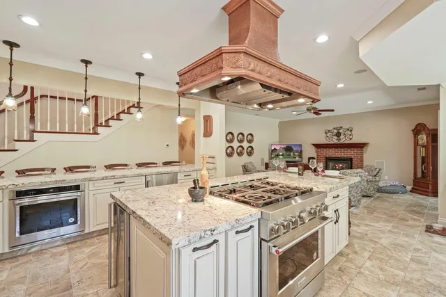 a kitchen with a stove and a sink