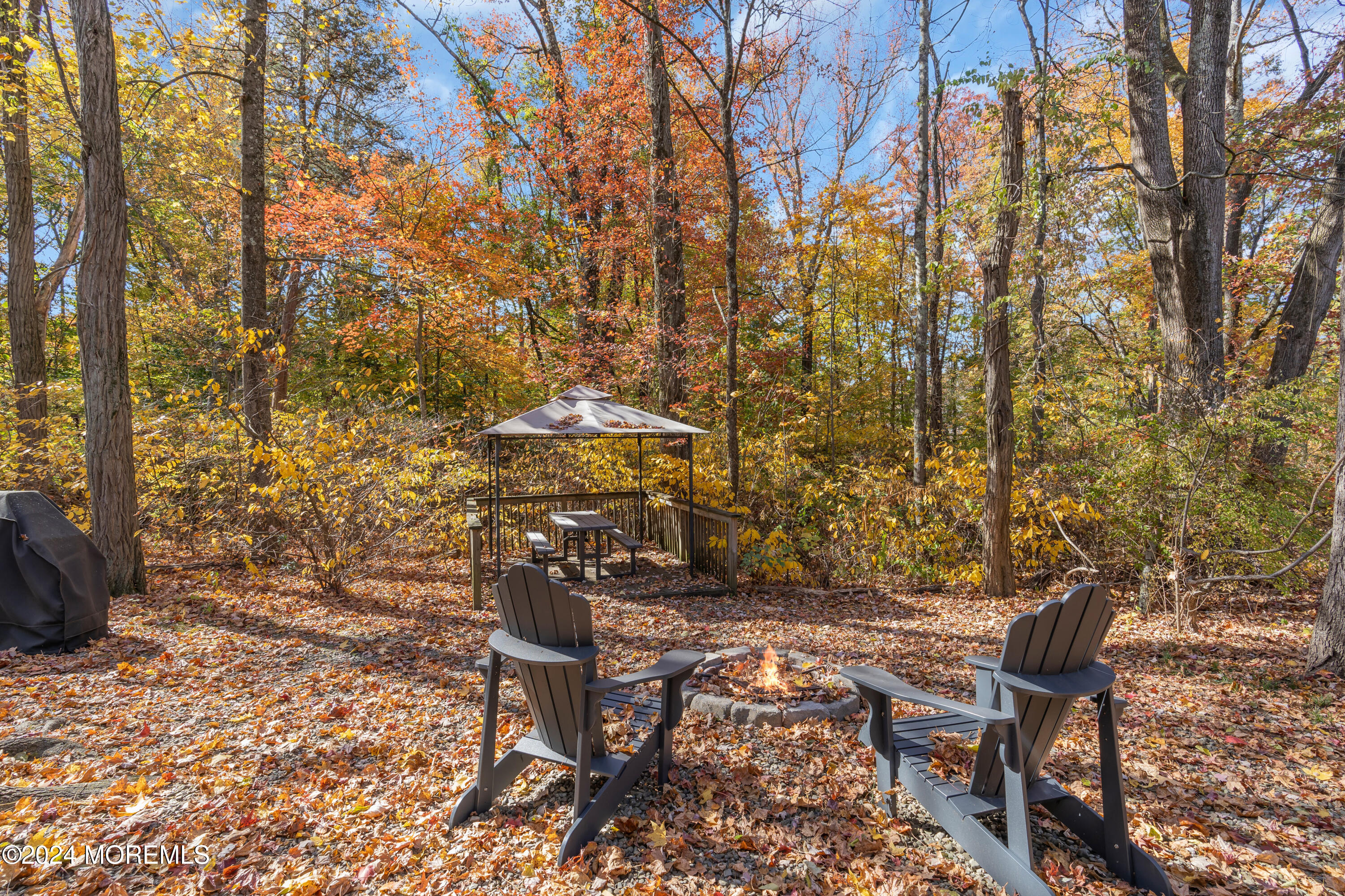 724 Monmouth Road, Unit 40 Cream Ridge, NJ 08514 - Photo 20 of 33 a view of outdoor space with table and chairs