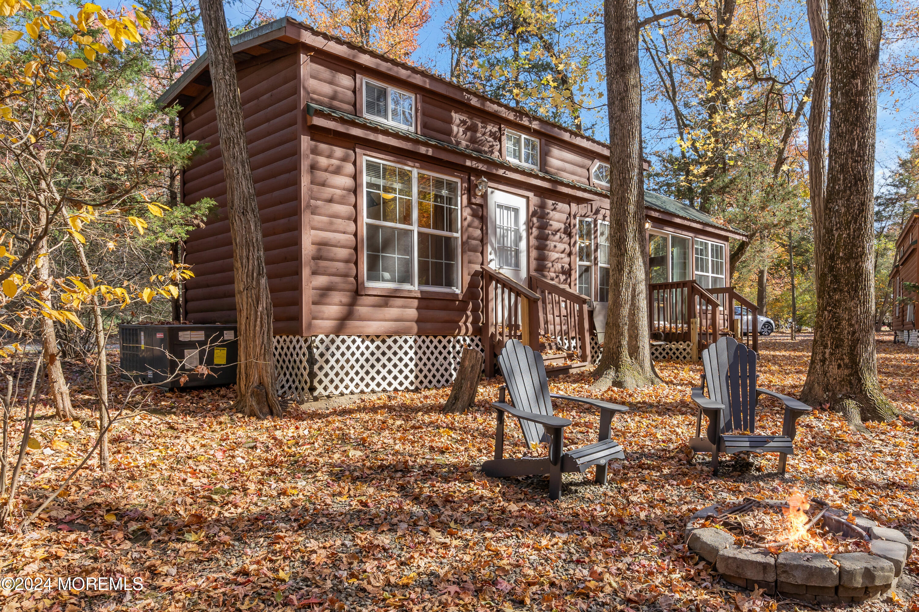 724 Monmouth Road, Unit 40 Cream Ridge, NJ 08514 - Photo 2 of 33 a front view of a house with a yard