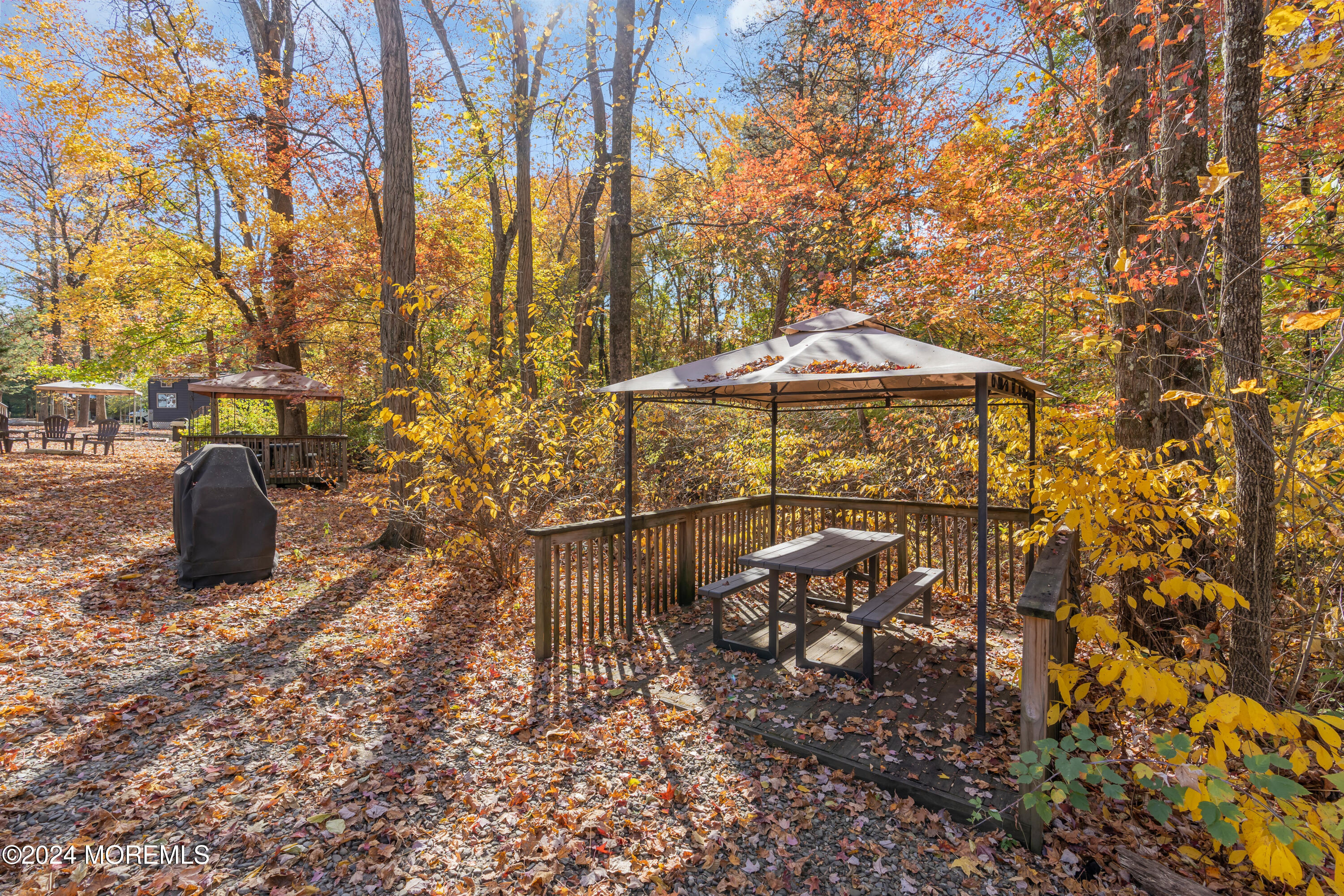 724 Monmouth Road, Unit 40 Cream Ridge, NJ 08514 - Photo 21 of 33 a patio with table and chairs