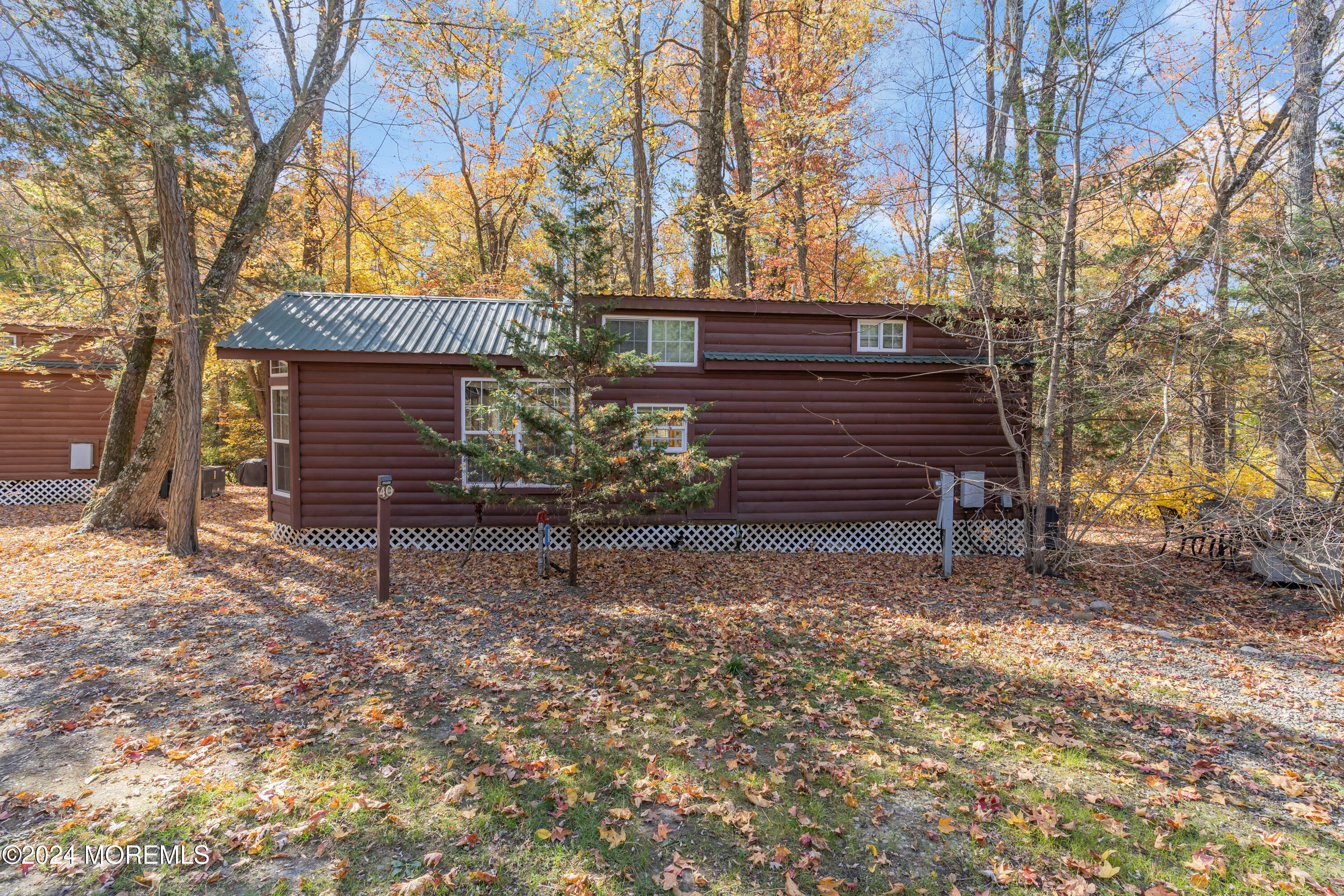 724 Monmouth Road, Unit 40 Cream Ridge, NJ 08514 - Photo 22 of 33 a view of a house with a yard