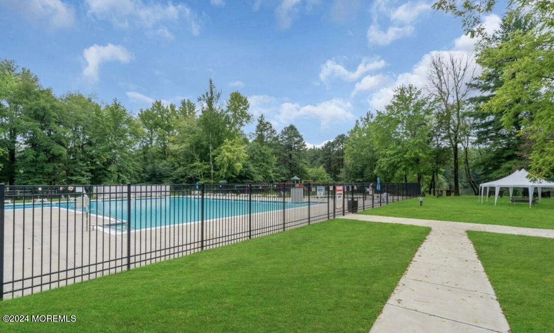 724 Monmouth Road, Unit 40 Cream Ridge, NJ 08514 - Photo 25 of 33 a view of a yard and a fence
