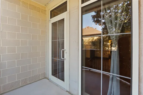 a kitchen with granite countertop a stove and a refrigerator
