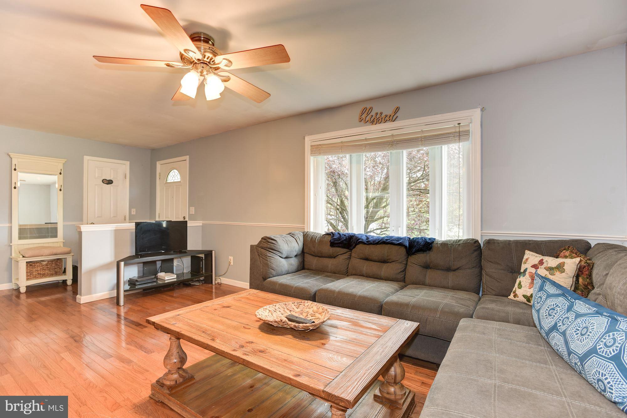7349 Gaither Road Sykesville, MD 21784 - Photo 2 of 37 Living Room | Hardwood Floors | Bay Window