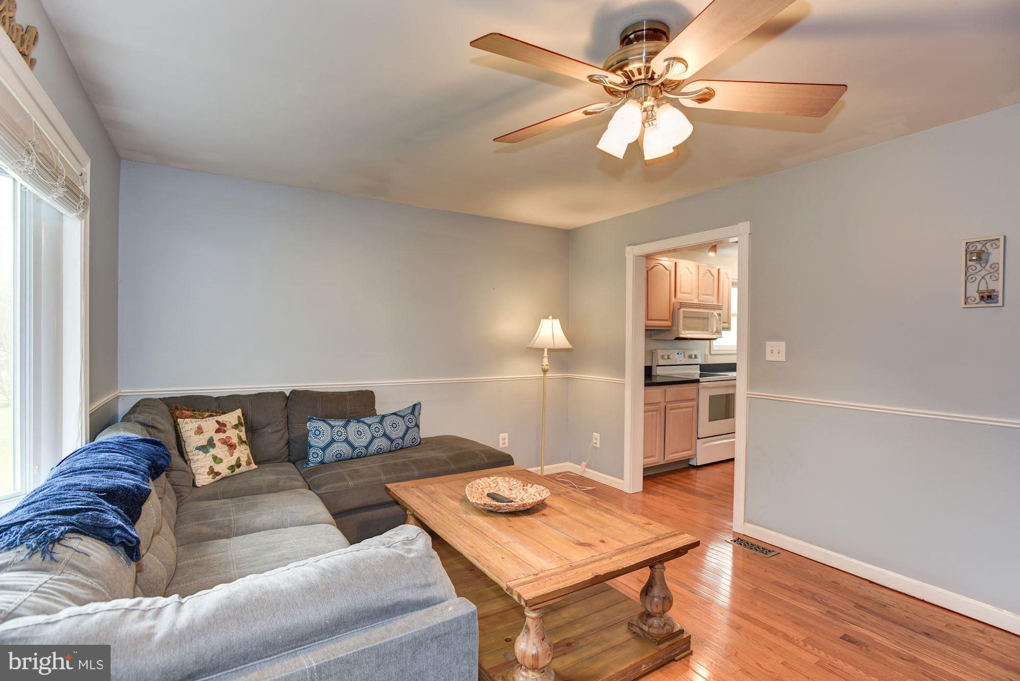 7349 Gaither Road Sykesville, MD 21784 - Photo 3 of 37 Living Room | Hardwood Floors | Bay Window